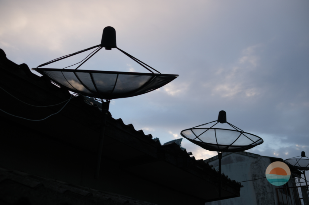 Satellite dishes crowd the rooftops of Ban Khrua, the Cham Muslim silk quarter where Jim Thompson's Bangkok began