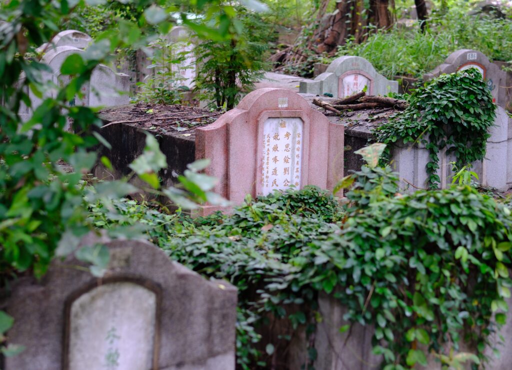 Overgrown Chinese graves at Wat Don Cemetery, Bangkok